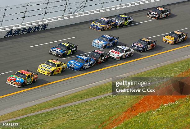 Kyle Busch, driver of the M&M's Toyota, leads the field during the NASCAR Sprint Cup Series Aaron's 499 at Talladega Superspeedway on April 27, 2008...
