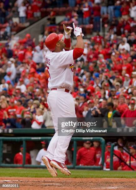 Albert Pujols of the St. Louis Cardinals celebrates after hitting a solo home run against the Houston Astros at Busch Stadium April 27, 2008 in St....