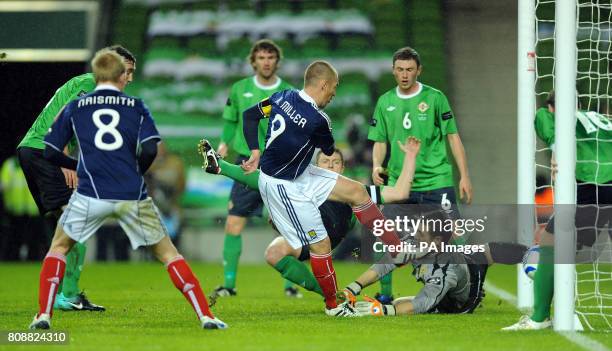 Scotland's Kenny Millar scores the first goal of the game during the Carling Nations Cup match at the Aviva Stadium, Dublin, Ireland.