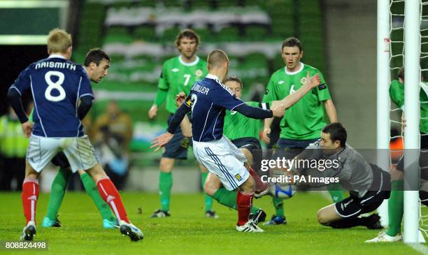 Scotland's Kenny Millar scores the first goal of the game during the Carling Nations Cup match at the Aviva Stadium, Dublin, Ireland.