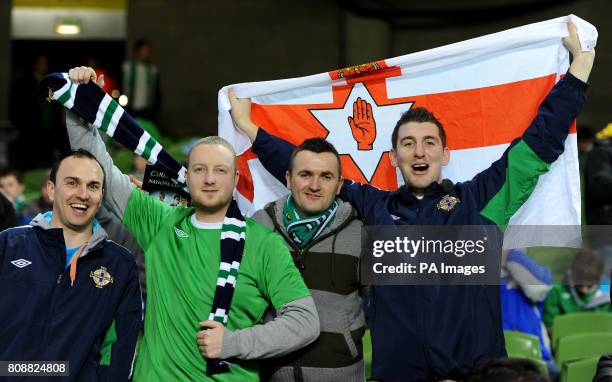 Northern Ireland fans show their support in the stands during the Carling Nations Cup match at the Aviva Stadium, Dublin, Ireland.