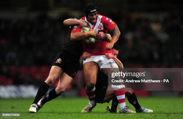 Celtic Crusaders' Lincoln Withers and Ryan O'Hara combine to tackle Salford City Reds' Iafeta Palea'Aesina during the Engage Super League match at...