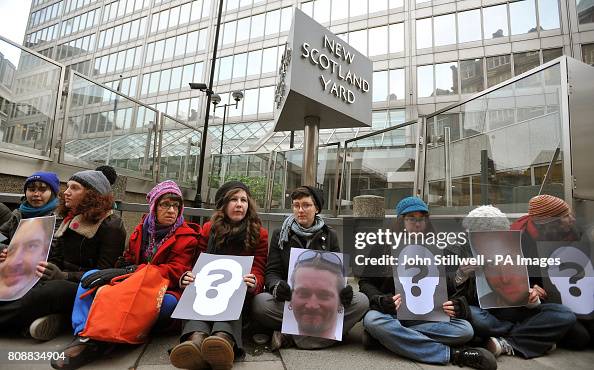 Protesters blockade New Scotland Yard Protesters blockade New Scotland Yard