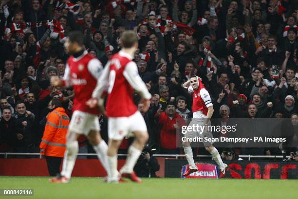 Arsenal's Francesc Fabregas celebrates scoring their third goal of the game