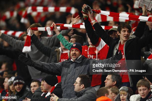 Arsenal fans show their support in the stands