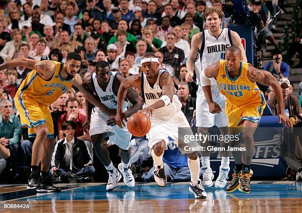 Jason Terry of the Dallas Mavericks gets away from the pack on the fast break against the New Orleans Hornets in Game Four of the Western Conference...