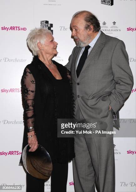 Dame Judi Dench and Sir Peter Hall in the press room at the South Bank Sky Arts Awards at the Dorchester Hotel, London.
