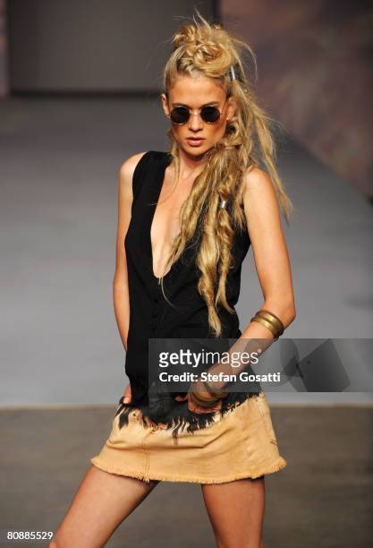 Model showcases an outift by designer One Teaspoon on the catwalk on the first day of the Rosemount Australian Fashion Week Spring/Summer 2008/09...