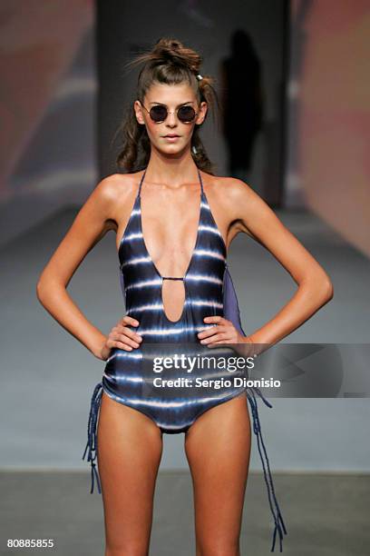 Model showcases an outift by designer One Teaspoon on the catwalk on the first day of the Rosemount Australian Fashion Week Spring/Summer 2008/09...