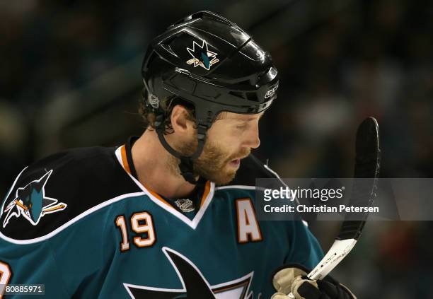 Joe Thornton of the San Jose Sharks inspects the blade of his stick during game two of the Western Conference Semifinals of the 2008 NHL Stanley Cup...