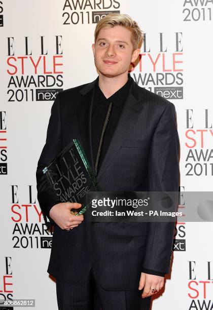 Dominic Jones with his award for Best Jewellery Designer during the Elle Style awards at the Grand Connaught Rooms, Great Queen Street, London.