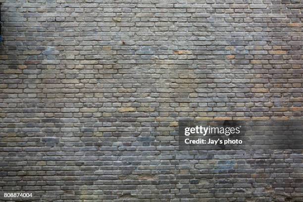 texture of real wall - grey brick wall stock pictures, royalty-free photos & images