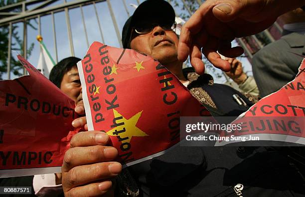 Chinese Rip Flag 18 China Flag Rip Stock Photos, High-Res Pictures, and Images - Getty ...