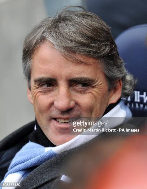 Manchester City manager Roberto Mancini near the touchline prior to kick-off