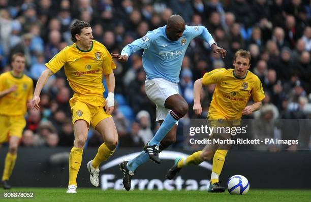 Manchester City's Patrick Vieira in action with Notts County's Alan Gow and Richard Ravenhill