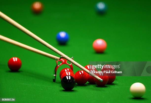 Generic view of the white ball being struck by the cue using the bridge during day ten of the 888.com World Snooker Championships at the Crucible...