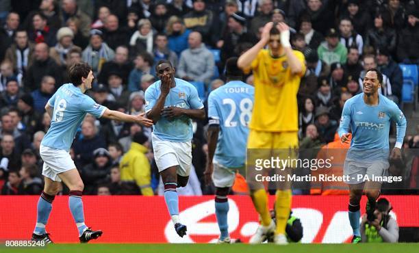 Manchester City's Micah Richards celebrates scoring his side's fifth goal of the game