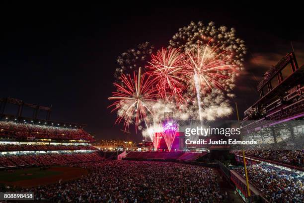 General view of the stadium as fans enjoy a fireworks display after the Cincinnati Reds 8-1 win against the Colorado Rockies at Coors Field on July...