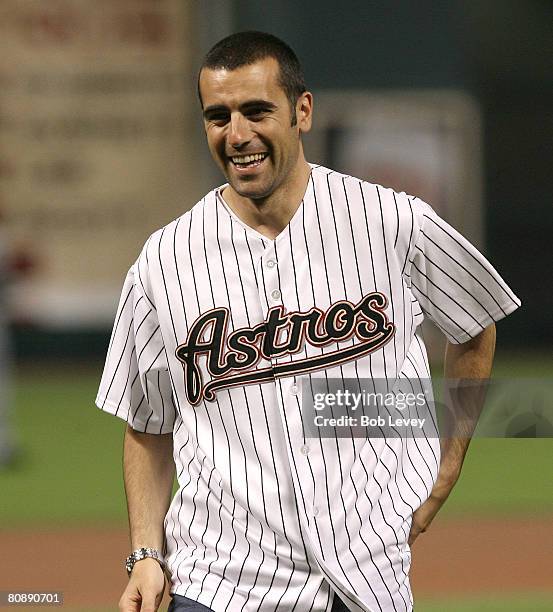 Indy 500 Champion Dario Franchitti throws out the first pitch prior to the Astros and Reds game Wednesday night at Minute Maid Park in Houston, Texas.