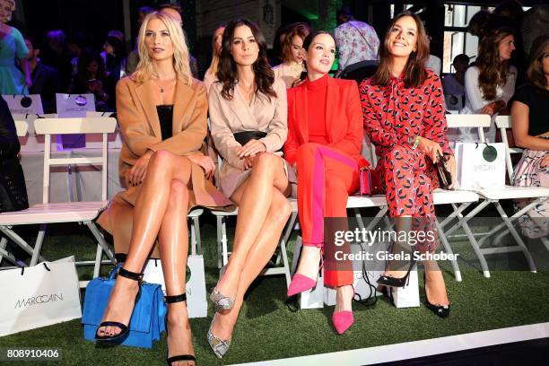 Model Lena Gercke, Lena Meyer-Landrut, Emilia Schuele and Janina Uhse during the Marc Cain Fashion Show Spring/Summer 2018 at ewerk on July 4, 2017...