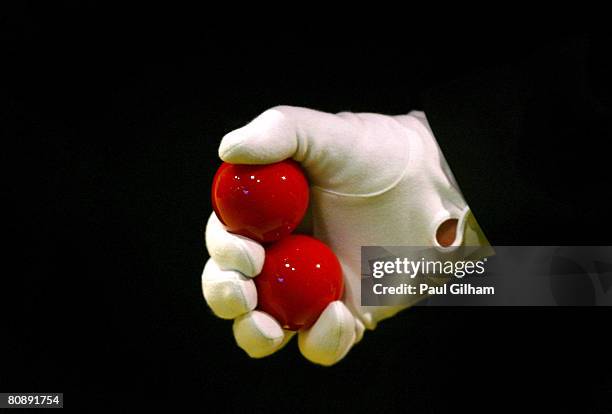 Generic view of the match referee holding two red balls during day ten of the 888.com World Snooker Championships at the Crucible Theatre on April...