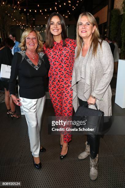 Janina Uhse and her mother Andrea Uhse and her grandmother Gabriela during the Marc Cain Fashion Show after show party Spring/Summer 2018 at ewerk on...