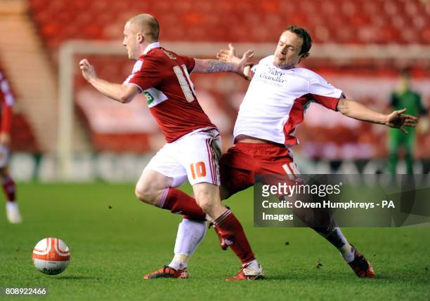 Middlesbrough's Nicky Bailey battles with Nottingham Forest's Paul McKenna during the npower Championship match at the Riverside Stadium,...