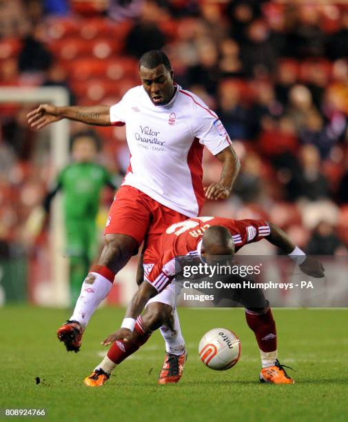 Nottingham Forest's Wes Morgan battles with Middlesbrough's Leroy Lita during the npower Championship match at the Riverside Stadium, Middlesbrough.