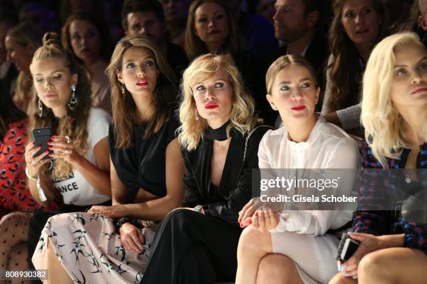 Victoria Swarovski, Marvy Rieder, Olesya Sudzilovskaya, Kamilla Baar and Joanna Horodynska sit front row during the Marc Cain Fashion Show...
