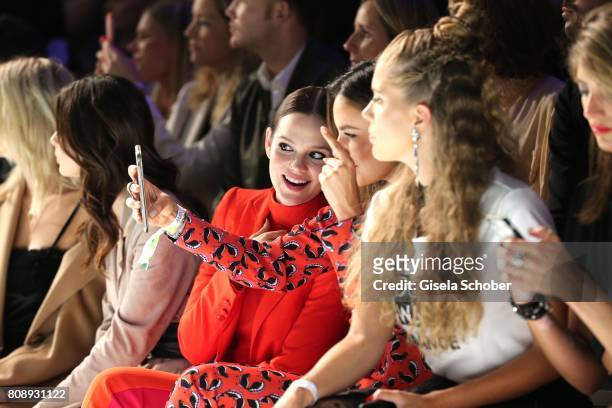 Emilia Schuele, Janina Uhse and Victoria Swarovski during the Marc Cain Fashion Show Spring/Summer 2018 at ewerk on July 4, 2017 in Berlin, Germany.