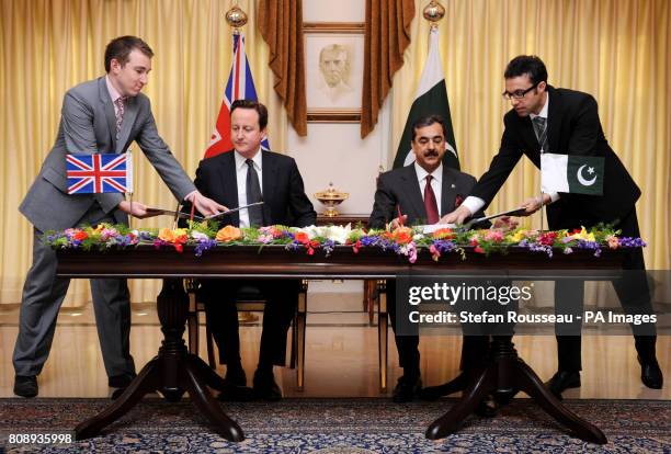 Prime Minister David Cameron signs an Enhanced Strategic Dialogue document between the UK and Pakistan with Pakistan Prime Minister Yusuf Raza Gilani...