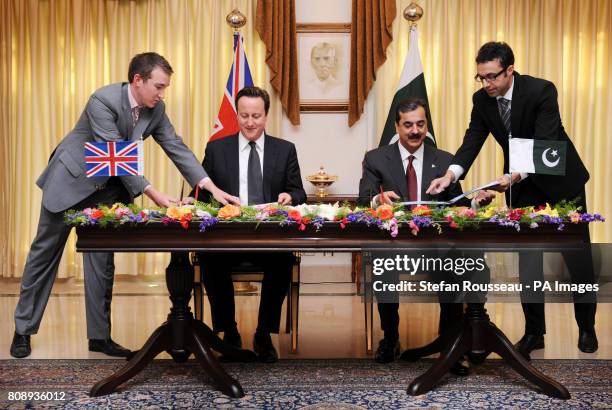 Prime Minister David Cameron signs an Enhanced Strategic Dialogue document between the UK and Pakistan with Pakistan Prime Minister Yusuf Raza Gilani...