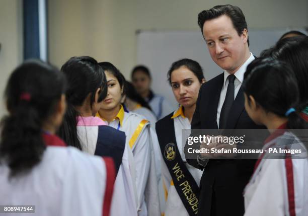 Prime Minister David Cameron meets pupils at Islamabad College for Girls in the Pakistan capital today as part of a one day visit to the region.