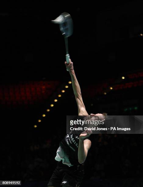 Denmark's Peter Hoeg Gade on his way to victory over Japan's Kenichi Tago during the Yonex All England Championships at the National Indoor Arena in...