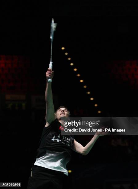 Denmark's Peter Hoeg Gade on his way to victory over Japan's Kenichi Tago during the Yonex All England Championships at the National Indoor Arena in...