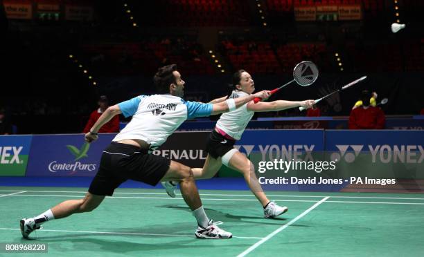 England's Jenny Wallwork and Nathan Robinson in action agsanst Robert Mateusiak and Nadiezda Zieba during the Yonex All England Championships at the...