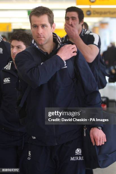 Scotland's Chris Paterson arrives at Edinburgh Airport as the team prepare to depart for London.