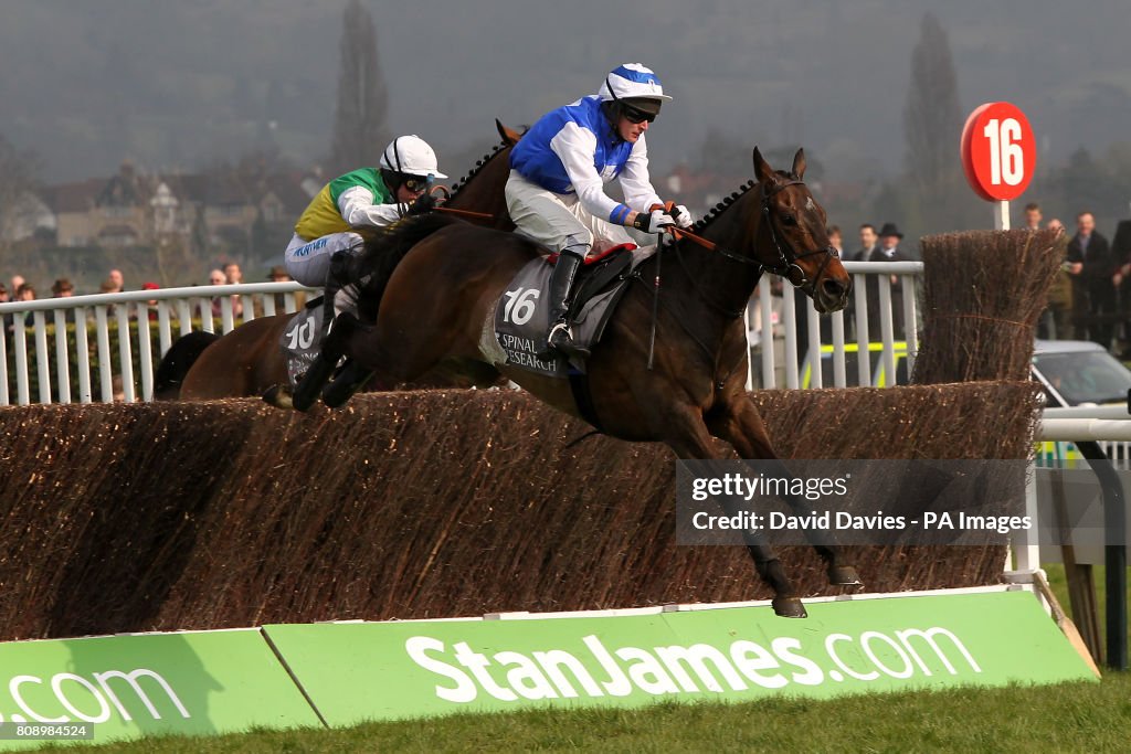 Ed Cookson Jockey Ed Cookson on The Rainbpw Hunter in action during the Stewart ...