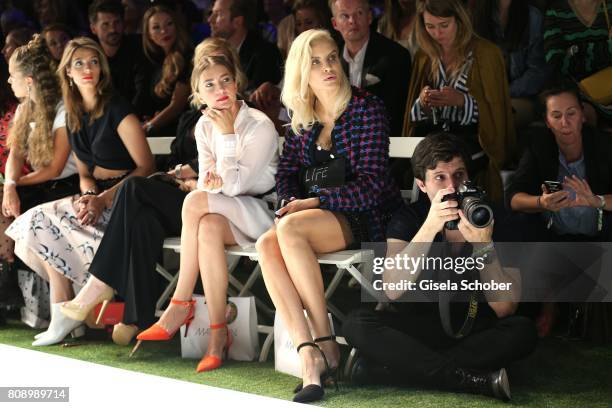 Marvy Rieder, Olesya Sudzilovskaya, Kamilla Baar and Joanna Horodynska sit front row during the Marc Cain Fashion Show Spring/Summer 2018 at ewerk on...