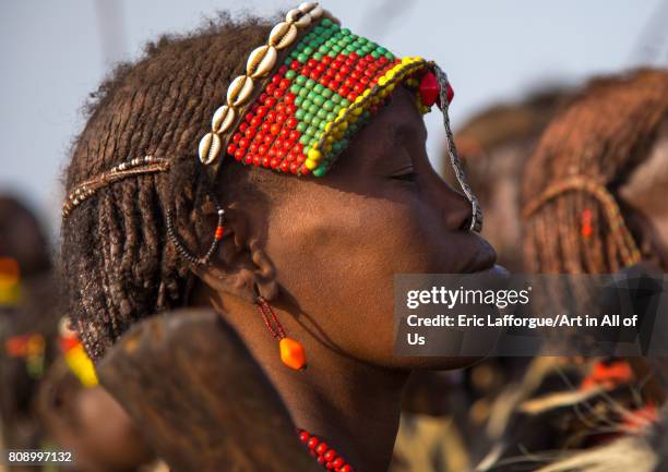 Woman during the Dimi ceremony in Dassanech tribe to celebrate circumcision of teenagers, Turkana County, Omorate, Ethiopia on June 7, 2017 in...