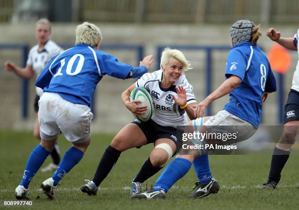 Scotland's Tanya Griffiths and Italy's Michela Tondinelli and Silvia Gaudino during the Women's 6 Nations match at Meggetland, Edinburgh.