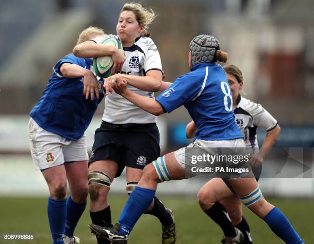 Scotland's Lindsay wheeler and Italy's Silvia Gaudino and Michela Este during the Women's 6 Nations match at Meggetland, Edinburgh.