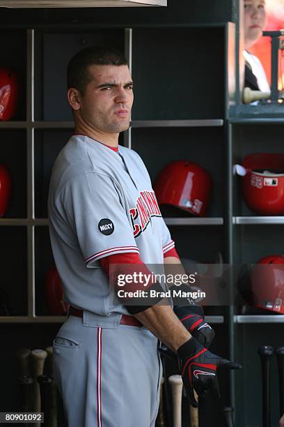 Joey Votto of the Cincinnati Reds grabs a bat in the dugout during the game against the San Francisco Giants at AT&T Park in San Francisco,...