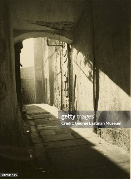 View of an alley illuminated by a shaft of light, Edinburgh, Scotland,