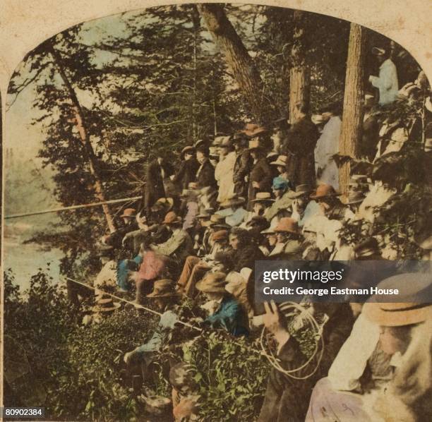 Crowd gathers to watch Charles Blondin attempt to cross Niagara Falls by tightrope, 06/30/1859