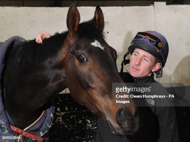 Champion jockey Paul Hanagan with Our Joe Mac, who is listed to run in the William Hill Lincoln at Doncaster on Saturday, during a media day at...