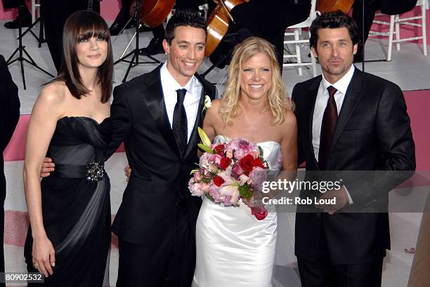 Actress Michelle Monaghan and actor Patrick Dempsey pose with newlyweds Shaun Bollinger and Michelle Golightly at the premiere of "Made of Honor" at...