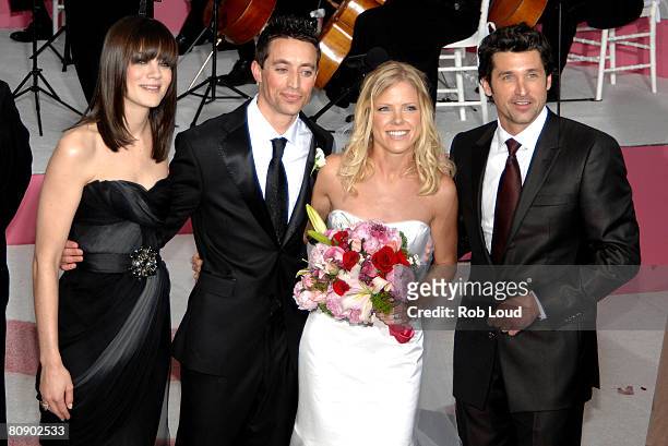 Actress Michelle Monaghan and actor Patrick Dempsey pose with newlyweds Shaun Bollinger and Michelle Golightly at the premiere of "Made of Honor" at...
