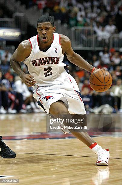 Guard Joe Johnson of the Atlanta Hawks drives to the basket in Game Four of the Eastern Conference Quarterfinals against the Boston Celtics during...