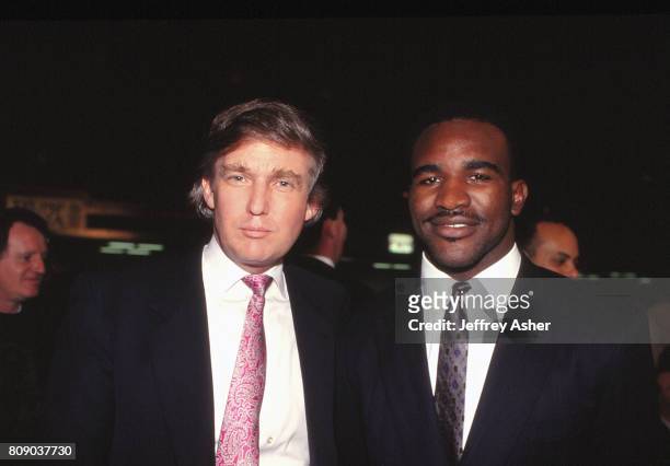 Businessman Donald Trump and Champion Boxer Evander Holyfield at Tyson vs Holmes Convention Hall in Atlantic City, New Jersey January 22 1988.
